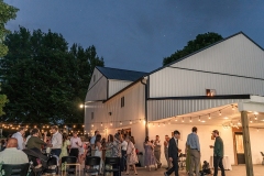 Barn Patio Lights glowing during reception